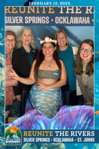 Riverkeeper and other experts with a mermaid